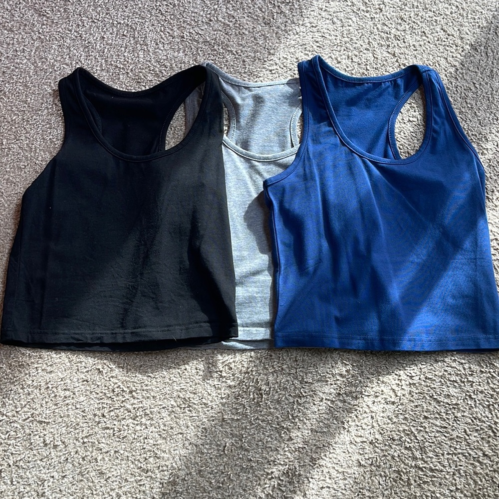 Medium, black, dark blue, white and gray razor back tank tops, crop tops
